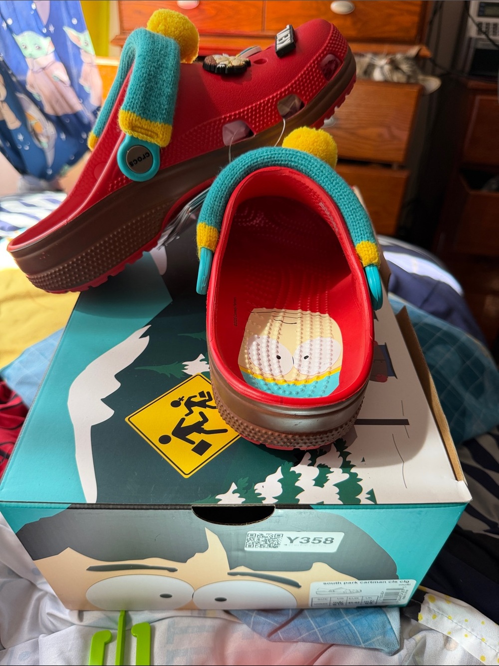 CROCS Kids Red Clog with Brown Sole and Teal Strap Accents